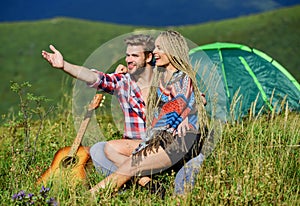 Hiking romance. Couple in love happy relaxing nature background. Love concept. Camping vacation. Camping in mountains