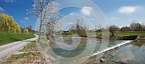 Hiking route along the riverside of mangfall river at springtime