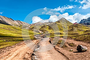 Hiking scene in Vinicunca, Cusco Region, Peru.