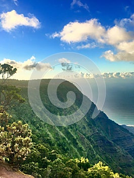 Hiking the scenic Kalalau Trail to the scenic Na Pali Coast in Kauai Hawaii