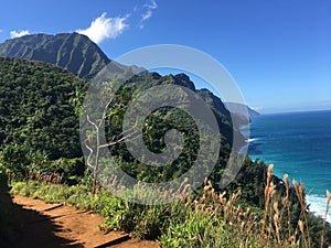 Hiking the scenic Kalalau Trail to the scenic Na Pali Coast in Kauai Hawaii