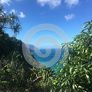 Hiking the scenic Kalalau Trail to the scenic Na Pali Coast in Kauai Hawaii