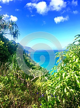 Hiking the scenic Kalalau Trail to the scenic Na Pali Coast in Kauai Hawaii