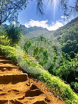 Hiking the scenic Kalalau Trail to the scenic Na Pali Coast in Kauai Hawaii