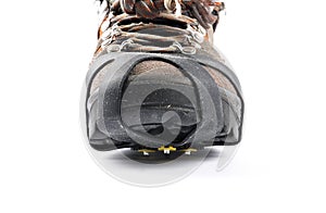 Hiking shoes with spikes on a white background