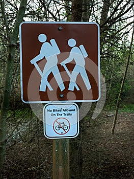Hiking sign No Bikes Allowed in forest