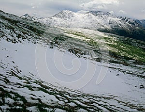 Hiking through snowfields on the south face of Peak 13500, Mt. Massive Wilderness, Colorado