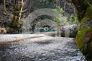 Hiking by source of kamniska bistrica in wintertime, slovenia