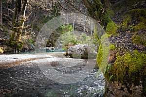 Hiking by source of kamniska bistrica in wintertime, slovenia