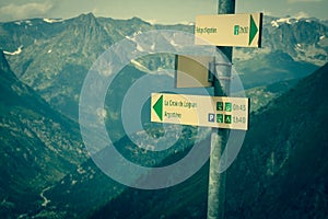 Hiking to Argentiere glacier with the view on the massif des Aiguilles Rouges in French Alps