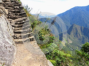Hiking to the top of Machu Picchu mountain to admire Machu Picchu from afar on a beautiful day in May.