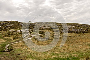 Hiking track leading to top of Mastravarden hill on Mosteroy island