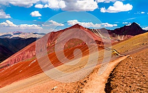 Hiking trail across the Red Valley at Vinicunca in Peru photo