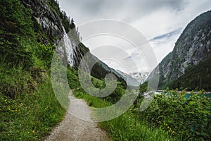 Hiking trail around Stillup Lake with mountain alpine waterfalls around Austria, Tyrol