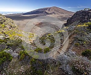 Hiking trail into the Caldeira of volcano Piton de la Fournaise at island La Reunion photo