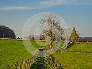 Hiking trail through the fields of Flemish ardennes