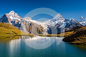 Encountering Bachalpsee when hiking First to Grindelwald Bernese Alps, Switzerland.