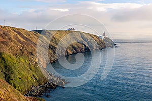 Hiking trail on Howth Island, Dublin, Ireland and Baily Lighthouse