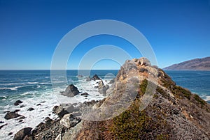 Hiking trail on knifes edge ridge at Ragged Point at Big Sur on the Central Coast of California United States