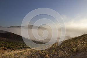 Point Mugu State Park, California, fog over the mountains