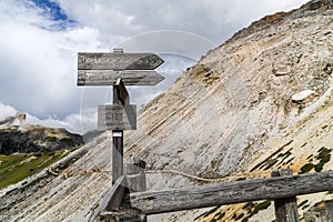 Hiking trail signs of Path 105 the Tre Cime di Lavaredo. Dolomites, Italy