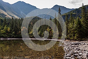 Hiking trails in Slovakia Tatra mountains near mountain lake of