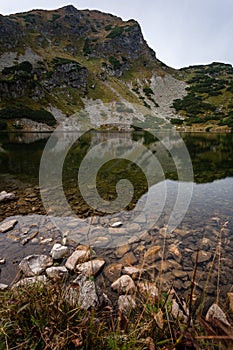 Hiking trails in Slovakia Tatra mountains near mountain lake of