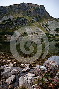 Hiking trails in Slovakia Tatra mountains near mountain lake of