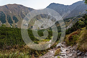 Hiking trails in Slovakia Tatra mountains near mountain lake of