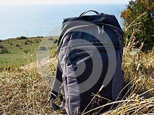 Hiking travel backpack with nature landscape background