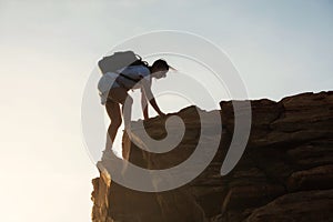 hiking woman climb to mountain summit