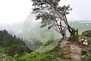 Hiking woman, climber or trail runner in mountains.