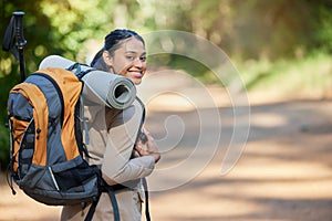 Hiking, woman and portrait of a hiker in a forest for adventure backpacking in nature. Female backpacker, hike and