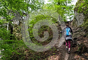 Hiking woman and Sulov castle, Slovakia