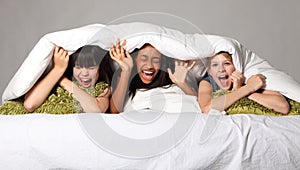 Hilarious laughter fun at teenage slumber party photo
