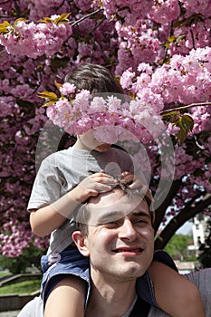 Ð¡hild playing with his father