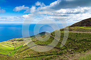 Hill of farm fields in the Corvo island in Azores, Portugal