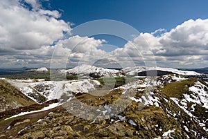 Hill of the Long Mynd, view on the Carding Mill Valley and Caer Caradoc, rocks in foreground, Shropshire Hills UK photo