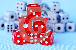 A hill of red cubes against the background of small white cubes