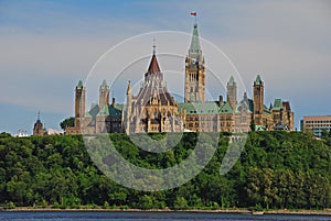 Magnificent Centre Block building complex on Parliament Hill from across the Ottawa River from Gatineau on a fine day