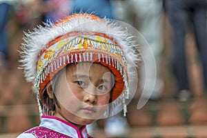 Hill tribe child in traditional clothing at Doi Suthep