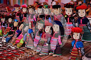Hill tribe dolls in Bac Ha market photo