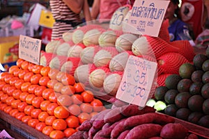 Hill tribeâ€‹ peopleâ€‹ selling Fruit and vegetable at local market, Hill tribe market in Chiangdao, Chiangmai, Thailand.