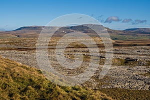 Hill walking the Norber Eratics around Austwick in Craven in  the Yorkshire Dales photo