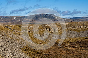 Hill walking the Norber Eratics around Austwick in Craven in  the Yorkshire Dales photo