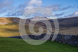 Hill walking the Norber Eratics around Austwick in Craven in  the Yorkshire Dales photo