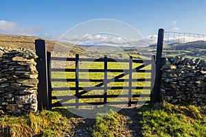 Hill walking the Norber Eratics around Austwick in Craven in  the Yorkshire Dales photo