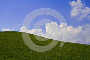 Hilll, sky and clouds