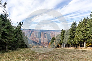 Hills and mountains on the horizon of beautiful nature with city in the forest valley view into vast distance of the Beskids Area