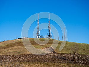 Hills with television antennas, telephone repeaters and wifi antennas